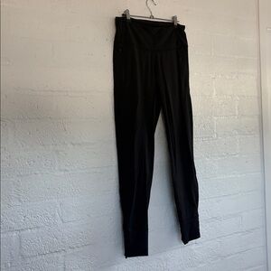 Lululemon joggers with reflective zippers at tapered leg and zipper pockets